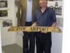 Christopher Balfour and Tony Packer with the Ryde airport taxi rank sign